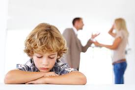 boy with parents.jpg Special Needs Children and Divorce Mediation