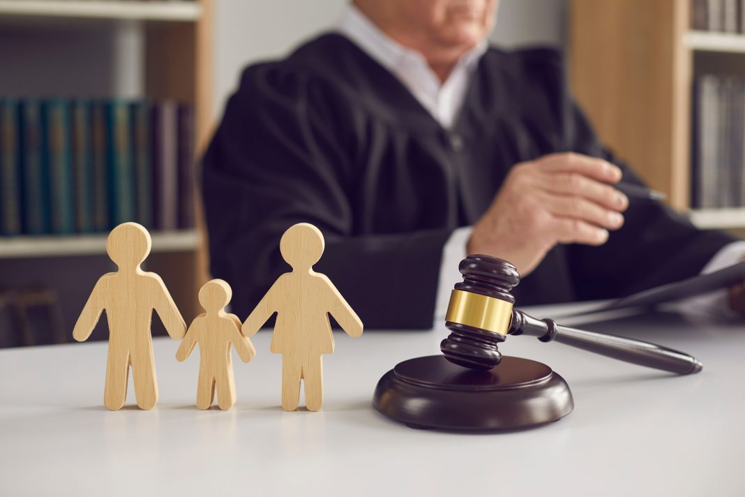 Gavel,,Sound,Block,And,Small,Wooden,Figurines,Of,Husband,,Wife A Breakdown of Child Custody Determination In The State of NY